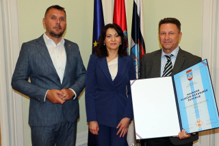 NAGRADA OSJEČKO-BARANJSKE ŽUPANIJE KUD-U TENA ĐAKOVO